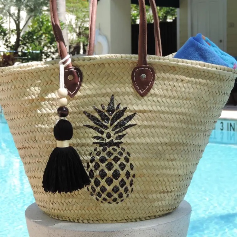 Hand-painted woven Pineapple Straw Bag vegan leather handles and tassel detail